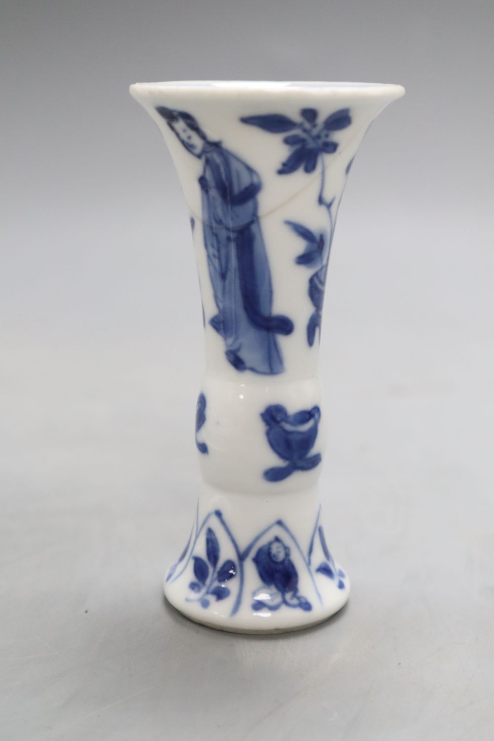 A Chinese blue and white vase and a dish bearing a Qianlong mark, diameter 11.5cm